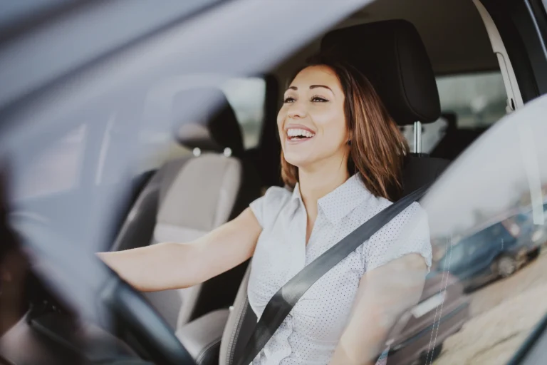 woman driving covered by hometown insurance agency